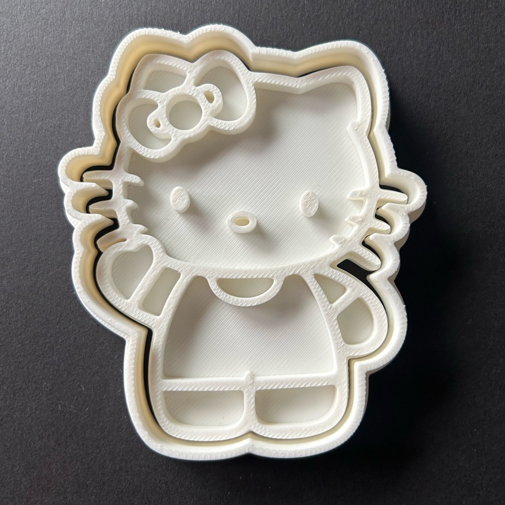 Hello Kitty Cookie Cutter and stamp.